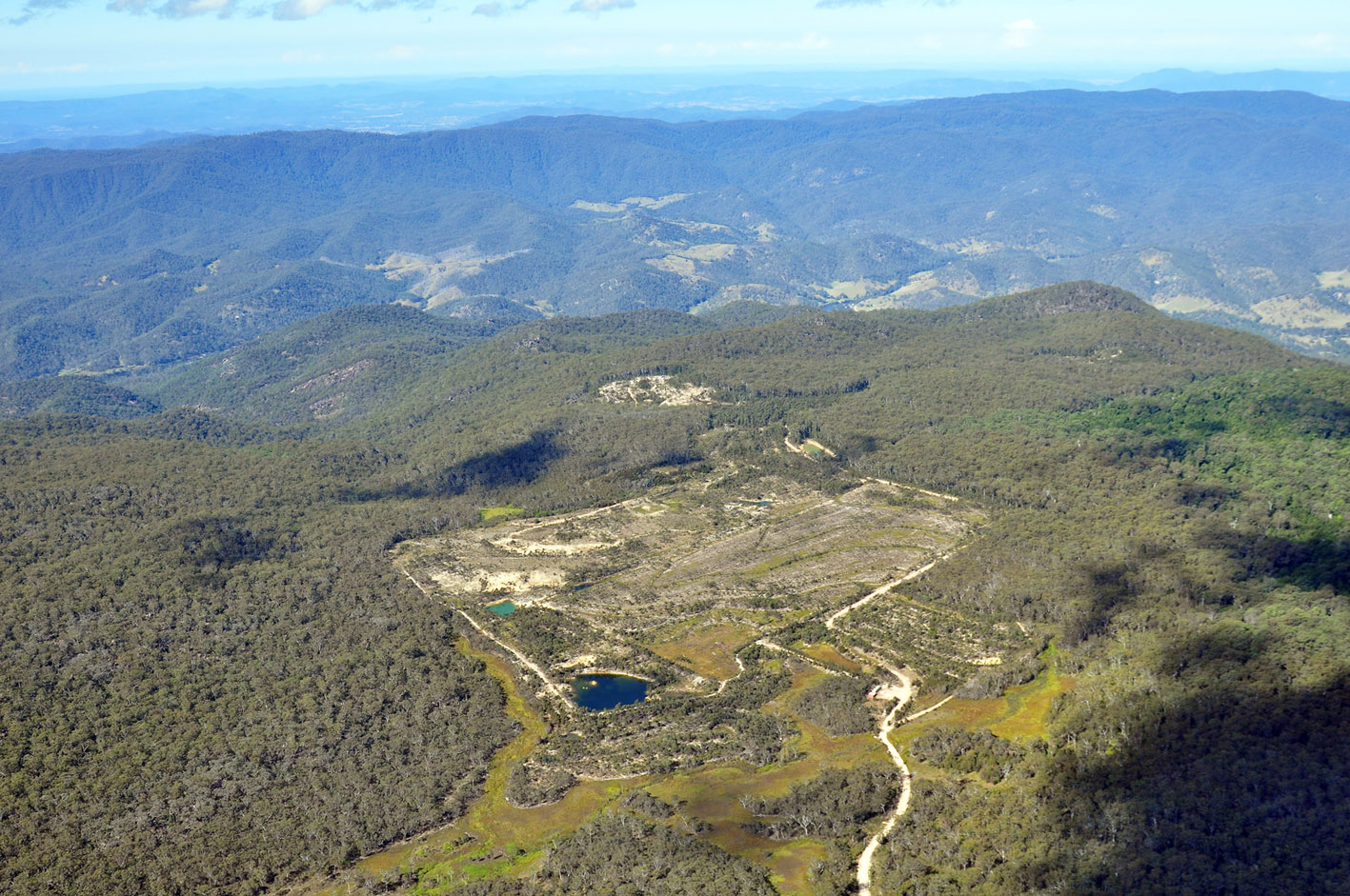 Aerial view of a rehabilitated resource project site in Australia showcasing environmental management and land restoration.